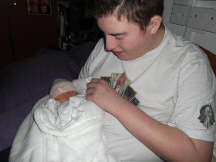 [Quinn holding Hattie]